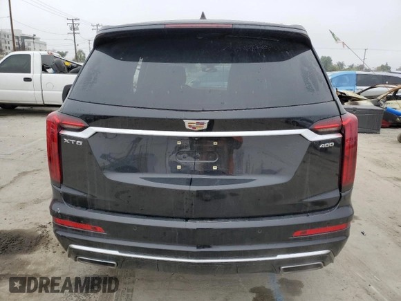 2023 Cadillac XT6 FWD Premium Luxury z VIN 1GYKPCRS5PZ119186, wystawiony jako Copart lot #50577175 z przebiegiem 32 189 mil mil oraz Szkoda całkowita • Salvage title. Historia ofert i sprzedaży dostępna na DreamBid. Obrazek 6.