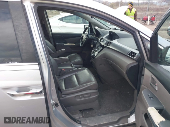 2011 Honda Odyssey EX-L with VIN 5FNRL5H60BB012206, listed as a IAAI auction lot 41982987 with 220,913 mi miles and . Bid and sale history available at carsss.com. Image 5.