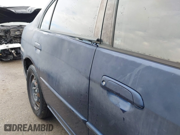 2005 Honda Civic LX z VIN 2HGES16505H583814, wystawiony jako IAAI lot #41798435 z przebiegiem 143 898 mil mil oraz . Historia ofert i sprzedaży dostępna na DreamBid. Obrazek 6.