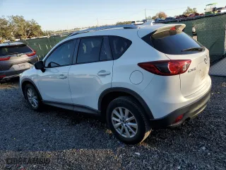 2016 Mazda CX-5 Sport with VIN JM3KE2BY3G0877107, listed as a Copart auction lot 87621635 with 83,093 mi miles and Salvage Title. Bid and sale history available at carsss.com. Image 2.