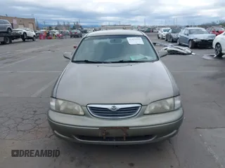 1999 Mazda 626 ES with VIN 1YVGF22C8X5900510, listed as a IAAI auction lot 41479213 with 178,182 mi miles. Bid and sale history available at carsss.com. Image 12.