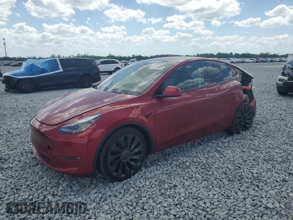 2024 Tesla Model Y Performance with VIN 7SAYGDEF1RF052175, listed as a Copart auction lot 51743895 with 4,869 mi miles and Salvage Title. Bid and sale history available at DreamBid. Image 1.