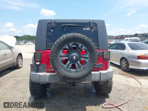 2007 Jeep Wrangler Unlimited X with VIN 1J4GA39107L187817, listed as a IAAI auction lot 42552732 with 149,702 mi miles and . Bid and sale history available at DreamBid. Image 16.