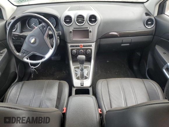 2014 Chevrolet Captiva Sport LT with VIN 3GNAL3EK9ES640609, listed as a Copart auction lot 74691734 with 150,482 mi miles and Salvage Title. Bid and sale history available at DreamBid. Image 8.