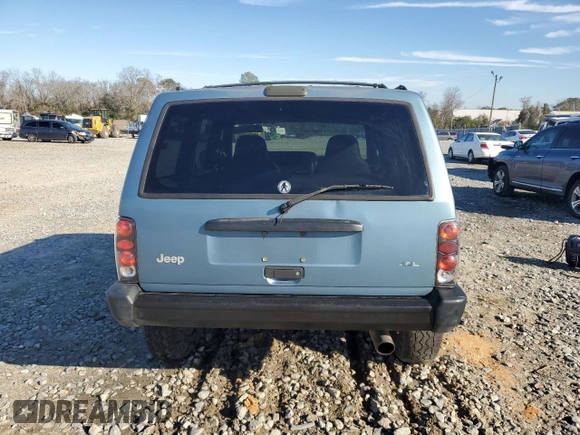 1998 Jeep Cherokee Sport with VIN 1J4FT68S0WL138603, listed as a Copart auction lot 86766454 with 0 mi miles and Salvage Title. Bid and sale history available at carsss.com. Image 6.