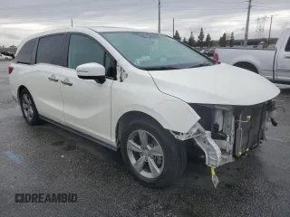 2018 Honda Odyssey EX-L with VIN 5FNRL6H77JB008571, listed as a Copart auction lot 46948585 with 88,699 mi miles and Salvage Title. Bid and sale history available at carsss.com. Image 4.