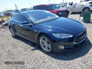 2014 Tesla Model S 60 with VIN 5YJSA1H18EFP31969, listed as a IAAI auction lot 42312485 with 90,043 mi miles and . Bid and sale history available at DreamBid. Image 1.