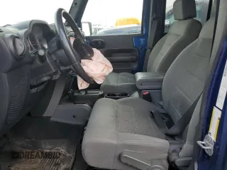 2009 Jeep Wrangler Unlimited Rubicon with VIN 1J4GA69199L713060, listed as a Copart auction lot 58543595 with 159,981 mi miles and Clean title. Bid and sale history available at DreamBid. Image 7.