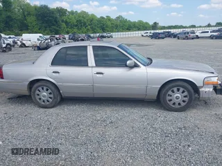 2004 Mercury Grand Marquis LS Premium z VIN 2MHFM75W84X658355, wystawiony jako IAAI lot #42166597 z przebiegiem 214 858 mil mil oraz . Historia ofert i sprzedaży dostępna na DreamBid. Obrazek 14.
