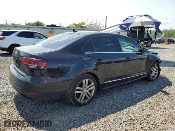 2017 Volkswagen Jetta SEL z VIN 3VWL17AJ6HM404789, wystawiony jako Copart lot #59029645 z przebiegiem 129 788 mil mil oraz Szkoda całkowita • Salvage title. Historia ofert i sprzedaży dostępna na DreamBid. Obrazek 3.