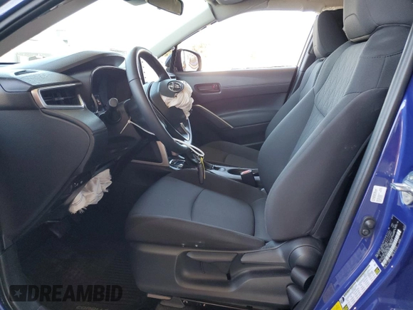2022 Toyota Corolla Cross LE with VIN 7MUCAAAG6NV021103, listed as a Copart auction lot 56882015 with 21,769 mi miles and Salvage title. Bid and sale history available at DreamBid. Image 7.