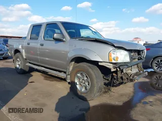 2004 Nissan Frontier XE z VIN 1N6ED27TX4C430206, wystawiony jako IAAI lot #41461934 z przebiegiem 238 555 mil mil oraz . Historia ofert i sprzedaży dostępna na DreamBid. Obrazek 1.