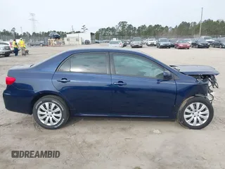 2012 Toyota Corolla L with VIN 5YFBU4EE6CP030641, listed as a IAAI auction lot 41864311 with 102,000 mi miles. Bid and sale history available at carsss.com. Image 13.
