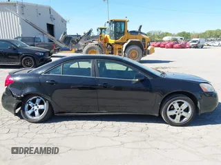 2005 Pontiac G6 GT z VIN 1G2ZH548454158374, wystawiony jako IAAI lot #42241745 z przebiegiem 154 612 mil mil oraz . Historia ofert i sprzedaży dostępna na DreamBid. Obrazek 13.