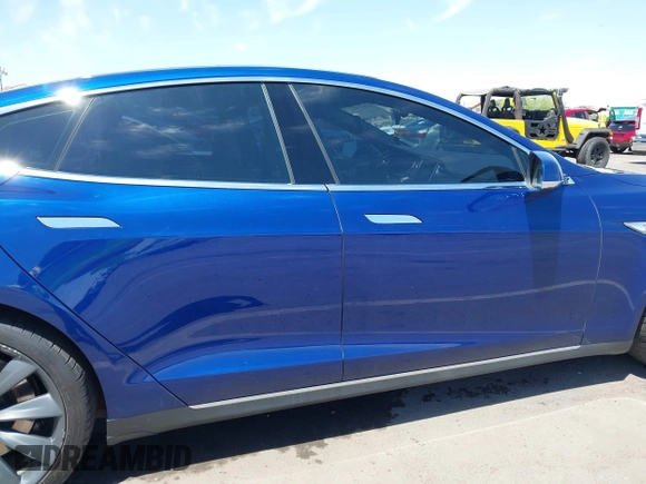 2016 Tesla Model S 70 kWh Battery with VIN 5YJSA1E10GF126433, listed as a IAAI auction lot 42169558 with 120,182 mi miles and . Bid and sale history available at carsss.com. Image 13.