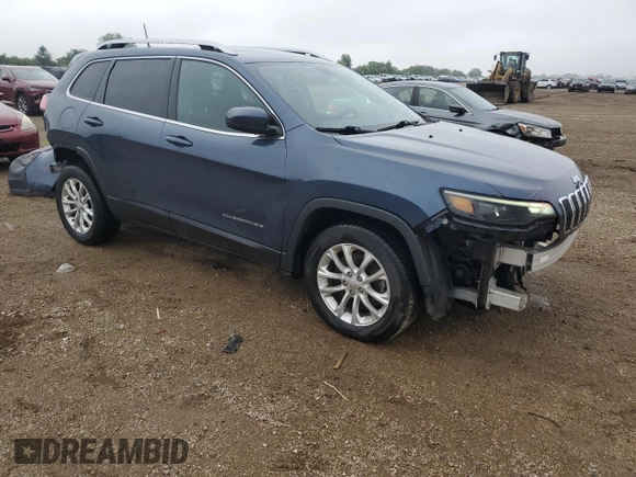 2019 Jeep Cherokee Latitude with VIN 1C4PJLCB9KD412004, listed as a Copart auction lot 61642015 with 121,336 mi miles and Salvage title. Bid and sale history available at DreamBid. Image 4.
