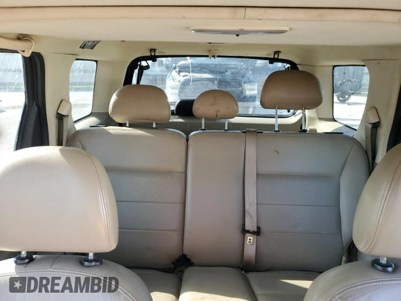 2006 Ford Escape Limited with VIN 1FMYU04116KA40963, listed as a Copart auction lot 61600525 with 208,696 mi miles and Salvage title. Bid and sale history available at DreamBid. Image 10.
