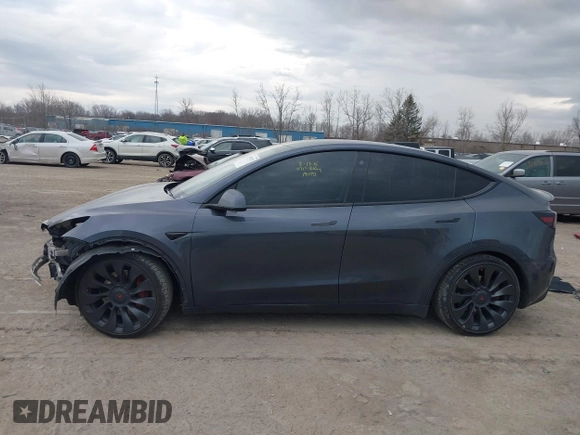 2023 Tesla Model Y Performance with VIN 7SAYGDEF2PF757113, listed as a IAAI auction lot 41881175 with 54,809 mi miles and . Bid and sale history available at DreamBid. Image 15.