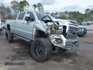 2019 GMC Sierra 2500HD Denali with VIN 1GT12SEY6KF173370, listed as a IAAI auction lot 41419940 with 126,693 mi miles. Bid and sale history available at carsss.com. Image 1.