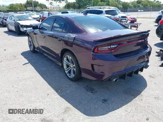 2021 Dodge Charger R/T with VIN 2C3CDXCTXMH603768, listed as a IAAI auction lot 41841121 with 19,272 mi miles and . Bid and sale history available at DreamBid. Image 3.