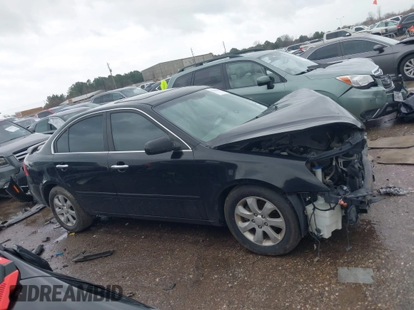 2008 Kia Optima LX z VIN KNAGE124X85234535, wystawiony jako IAAI lot #41569863 z przebiegiem 182 318 mil mil oraz . Historia ofert i sprzedaży dostępna na DreamBid. Obrazek 13.