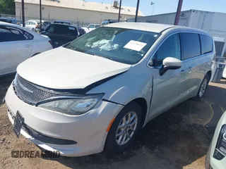2017 Chrysler Pacifica Touring with VIN 2C4RC1DG6HR633826, listed as a IAAI auction lot 42170041 with 143,481 mi miles and . Bid and sale history available at DreamBid. Image 17.