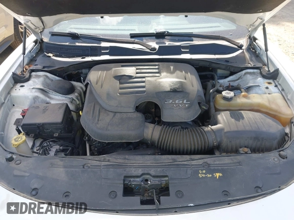 2015 Dodge Charger SXT with VIN 2C3CDXJG3FH742777, listed as a IAAI auction lot 42763427 with 151,409 mi miles and . Bid and sale history available at DreamBid. Image 10.