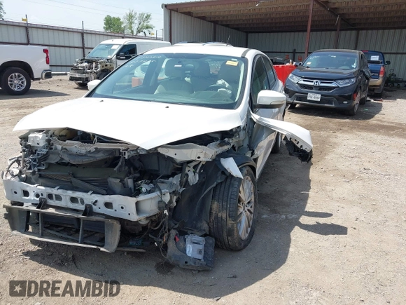 2016 Ford Focus Titanium with VIN 1FADP3N28GL222941, listed as a IAAI auction lot 42050881 with 97,001 mi miles and . Bid and sale history available at DreamBid. Image 17.