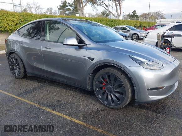 2024 Tesla Model Y Performance z VIN 7SAYGDEF5RA322392, wystawiony jako IAAI lot #41939339 z przebiegiem 20 808 mil mil oraz . Historia ofert i sprzedaży dostępna na DreamBid. Obrazek 1.
