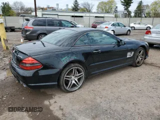 2009 Mercedes-Benz SL 55/63 AMG with VIN WDBSK70F79F157839, listed as a Copart auction lot 52350295 with 79,670 mi miles and Salvage title. Bid and sale history available at DreamBid. Image 3.