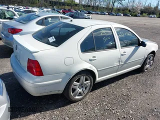 2003 Volkswagen Jetta GL with VIN 3VWRK69MX3M037355, listed as a IAAI auction lot 42141665 with Not provided miles and . Bid and sale history available at DreamBid. Image 4.