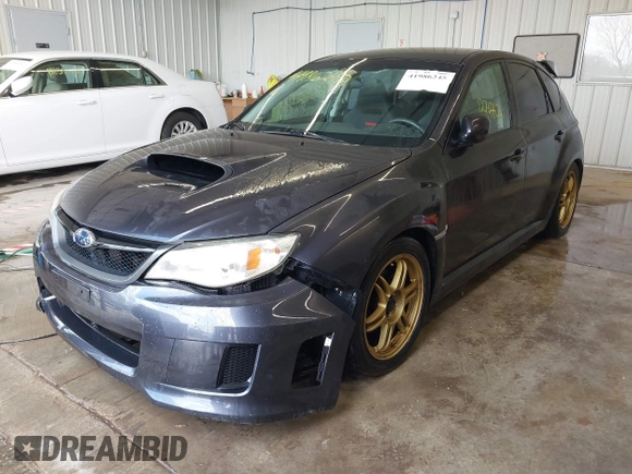 2013 Subaru WRX WRX with VIN JF1GR7E6XDG838095, listed as a IAAI auction lot 41986245 with 127,440 mi miles and . Bid and sale history available at DreamBid. Image 2.