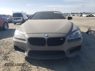 2015 BMW M6 z VIN WBS6C9C52FD467461, wystawiony jako Copart lot #68057084 z przebiegiem 130 687 mil mil oraz Szkoda całkowita • Salvage title. Historia ofert i sprzedaży dostępna na DreamBid. Obrazek 5.