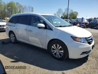 2016 Honda Odyssey EX-L with VIN 5FNRL5H66GB129277, listed as a Copart auction lot 54851955 with 147,496 mi miles and Clean Title. Bid and sale history available at carsss.com. Image 4.