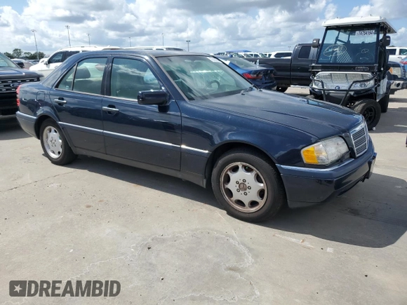 1996 Mercedes-Benz C with VIN WDBHA28E3TF392659, listed as a Copart auction lot 75169934 with Not Provided miles and Salvage Title. Bid and sale history available at carsss.com. Image 4.