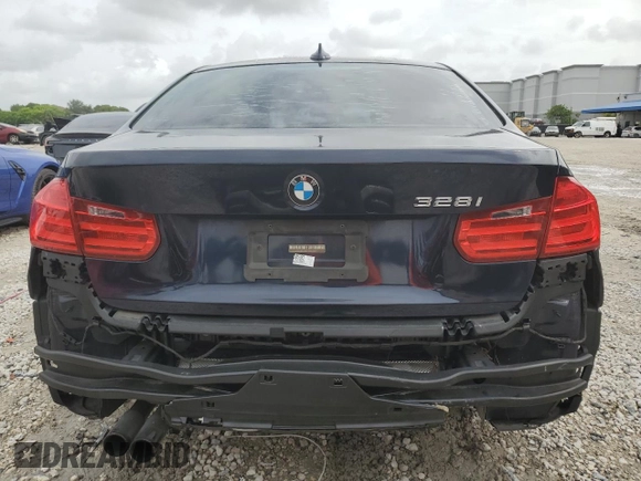 2012 BMW 3 Series 328i with VIN WBA3A5G51CNP17682, listed as a Copart auction lot 59619485 with 100,936 mi miles and Salvage title. Bid and sale history available at DreamBid. Image 6.