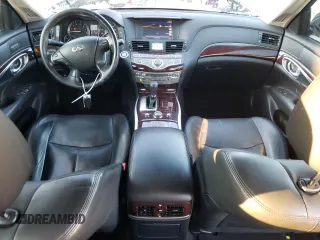2015 Infiniti Q70 z VIN JN1BY1PR0FM830851, wystawiony jako Copart lot #87606685 z przebiegiem 116 148 mil mil oraz Szkoda całkowita • Salvage title. Historia ofert i sprzedaży dostępna na DreamBid. Obrazek 8.