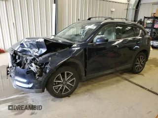 2018 Mazda CX-5 Grand Touring with VIN JM3KFBDM9J0472853, listed as a Copart auction lot 85109694 with Not Provided miles and Salvage Title. Bid and sale history available at carsss.com. Image 1.