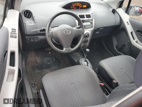 2011 Toyota Yaris with VIN JTDJT4K37B5339113, listed as a Copart auction lot 82474554 with 148,800 mi miles and Salvage Title. Bid and sale history available at carsss.com. Image 8.