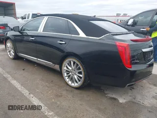 2013 Cadillac XTS Platinum z VIN 2G61V5S37D9194227, wystawiony jako IAAI lot #41510449 z przebiegiem 114 243 mil mil oraz . Historia ofert i sprzedaży dostępna na DreamBid. Obrazek 3.
