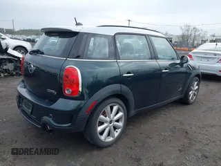 2011 MINI Countryman S with VIN WMWZC5C54BWL54135, listed as a IAAI auction lot 42034897 with 130,082 mi miles and . Bid and sale history available at DreamBid. Image 4.