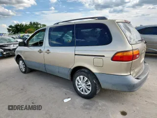 2000 Toyota Sienna LE with VIN 4T3ZF13C2YU218417, listed as a Copart auction lot 63328035 with 263,439 mi miles and Salvage title. Bid and sale history available at DreamBid. Image 2.