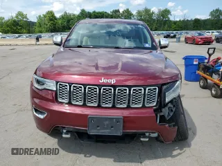 2017 Jeep Grand Cherokee Overland with VIN 1C4RJFCG5HC874130, listed as a Copart auction lot 65324695 with 101,588 mi miles and Salvage title. Bid and sale history available at DreamBid. Image 5.