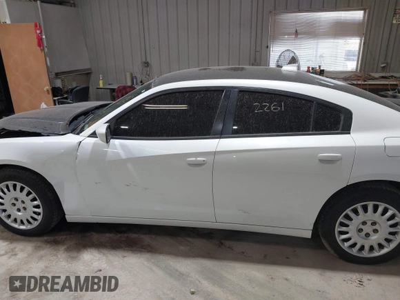 2015 Dodge Charger SXT with VIN 2C3CDXJG9FH785729, listed as a IAAI auction lot 41802261 with 145,974 mi miles. Bid and sale history available at carsss.com. Image 14.