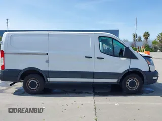 2020 Ford Transit Cargo with VIN 1FTBR1Y80LKA67205, listed as a IAAI auction lot 41805459 with 184,186 mi miles and . Bid and sale history available at DreamBid. Image 12.