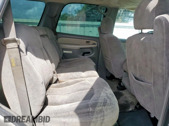 2002 Chevrolet Tahoe LS z VIN 1GNEC13V92R136479, wystawiony jako Copart lot #59803055 z przebiegiem 165 718 mil mil oraz Czysty tytuł • Clean title. Historia ofert i sprzedaży dostępna na DreamBid. Obrazek 11.