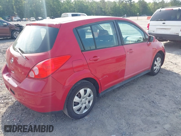2012 Nissan Versa S with VIN 3N1BC1CP2CL374585, listed as a IAAI auction lot 42209609 with 196,501 mi miles. Bid and sale history available at carsss.com. Image 4.
