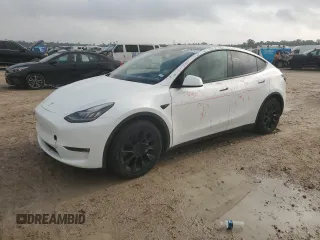 2021 Tesla Model Y Standard Range z VIN 5YJYGDEDXMF107128, wystawiony jako Copart lot #53026715 z przebiegiem 53 050 mil mil oraz Czysty tytuł • Clean title. Historia ofert i sprzedaży dostępna na DreamBid. Obrazek 1.