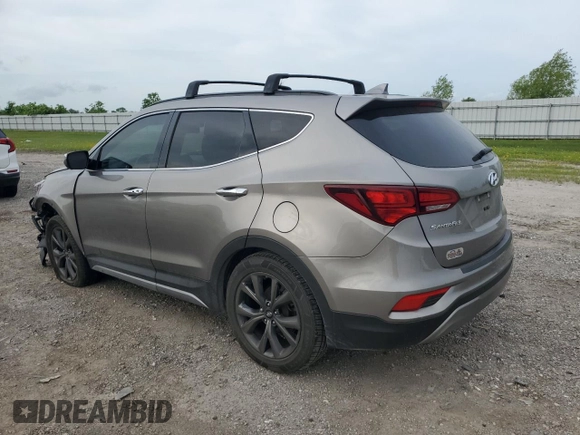 2017 Hyundai Santa Fe Ultimate with VIN 5XYZW4LA4HG488067, listed as a Copart auction lot 54984005 with 100,784 mi miles and Salvage title. Bid and sale history available at DreamBid. Image 2.