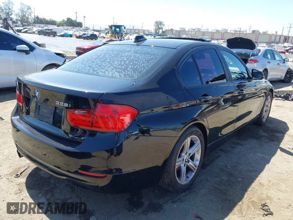 2013 BMW 3 Series 328i with VIN WBA3C1C51DF439693, listed as a IAAI auction lot 42644270 with 332,474 mi miles and . Bid and sale history available at DreamBid. Image 4.